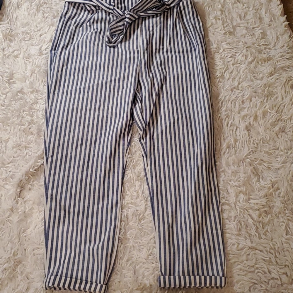 Light blue jean strip and white trousers